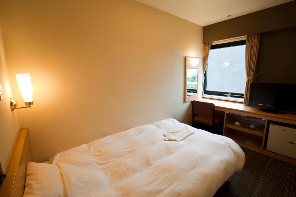 Harmonie Cinq Hotel Kitakyushu Kamer foto
